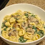 Creamy Spinach Mushroom Tortellini with Caramelized Onions