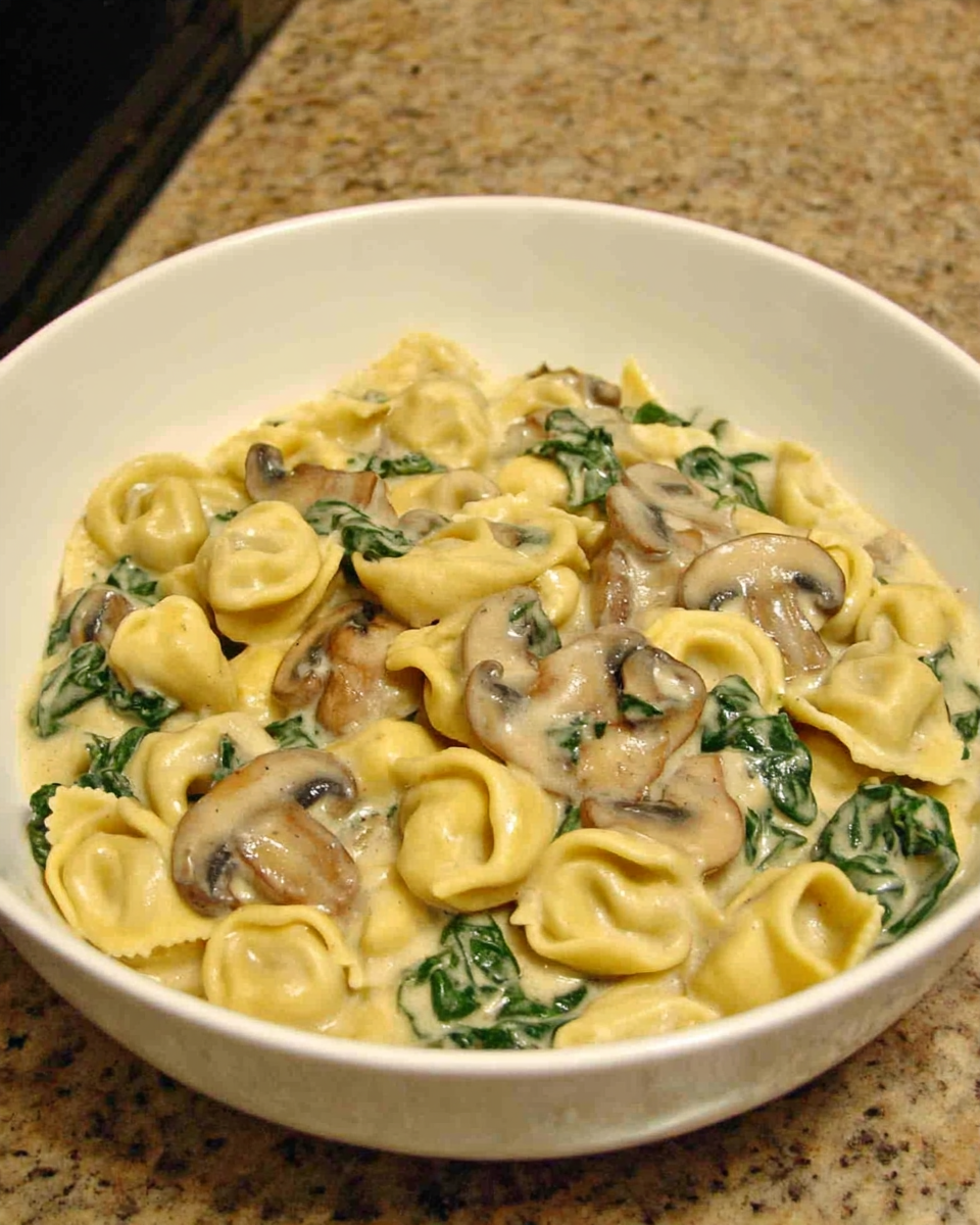 Creamy Spinach Mushroom Tortellini with Caramelized Onions