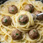 Garlic Butter Meatballs over Creamy Parmesan Linguine